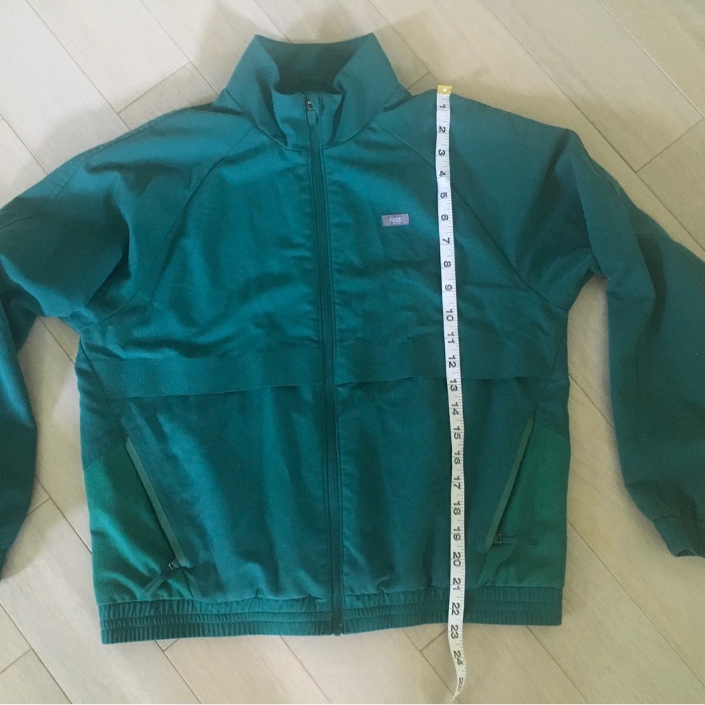 FIGS Sydney Scrub Jacket in a hunter green color - Picture 6 of 13